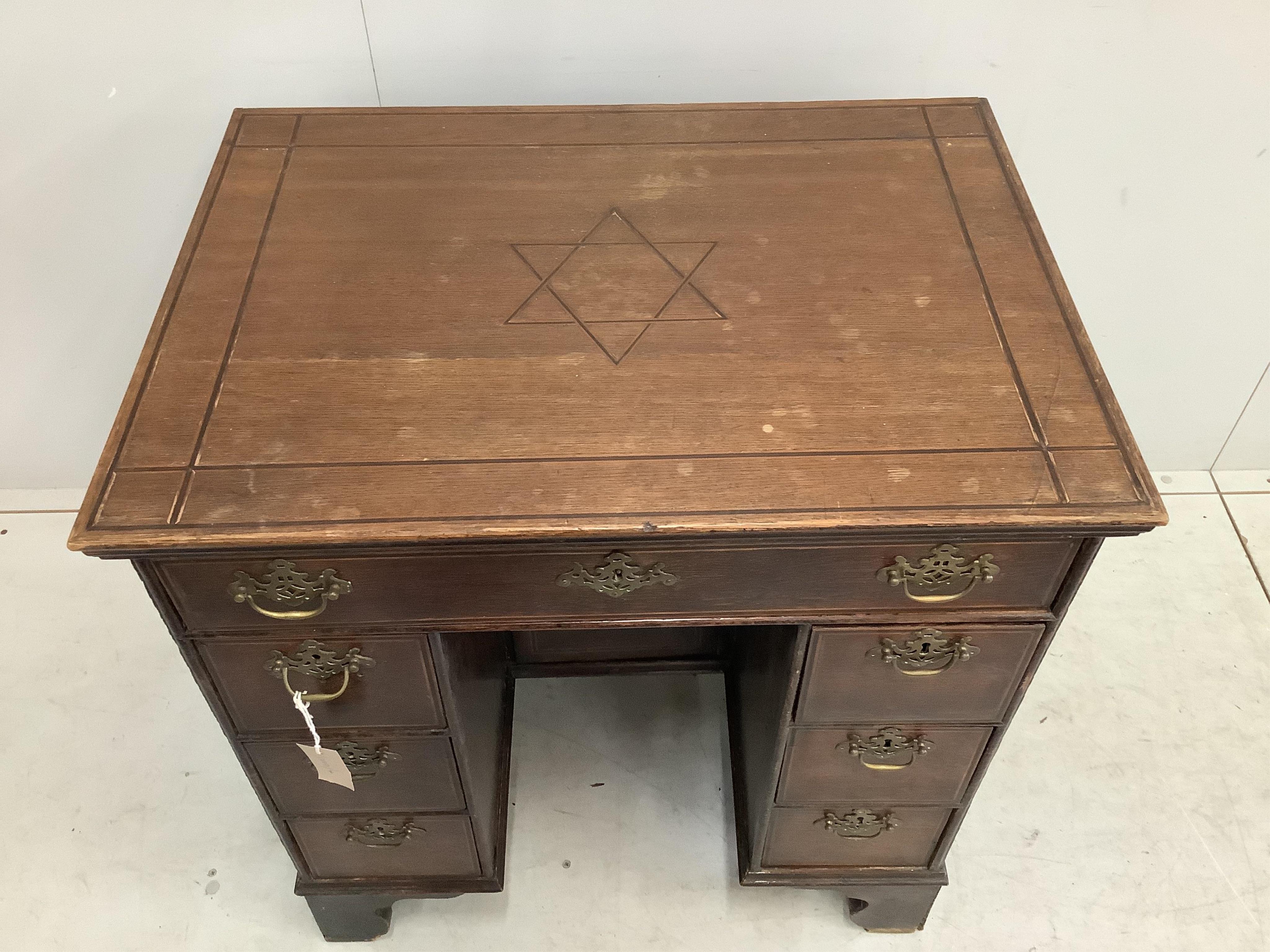A 19th century banded oak kneehole desk, width 73cm, depth 53cm, height 80cm. Condition - fair